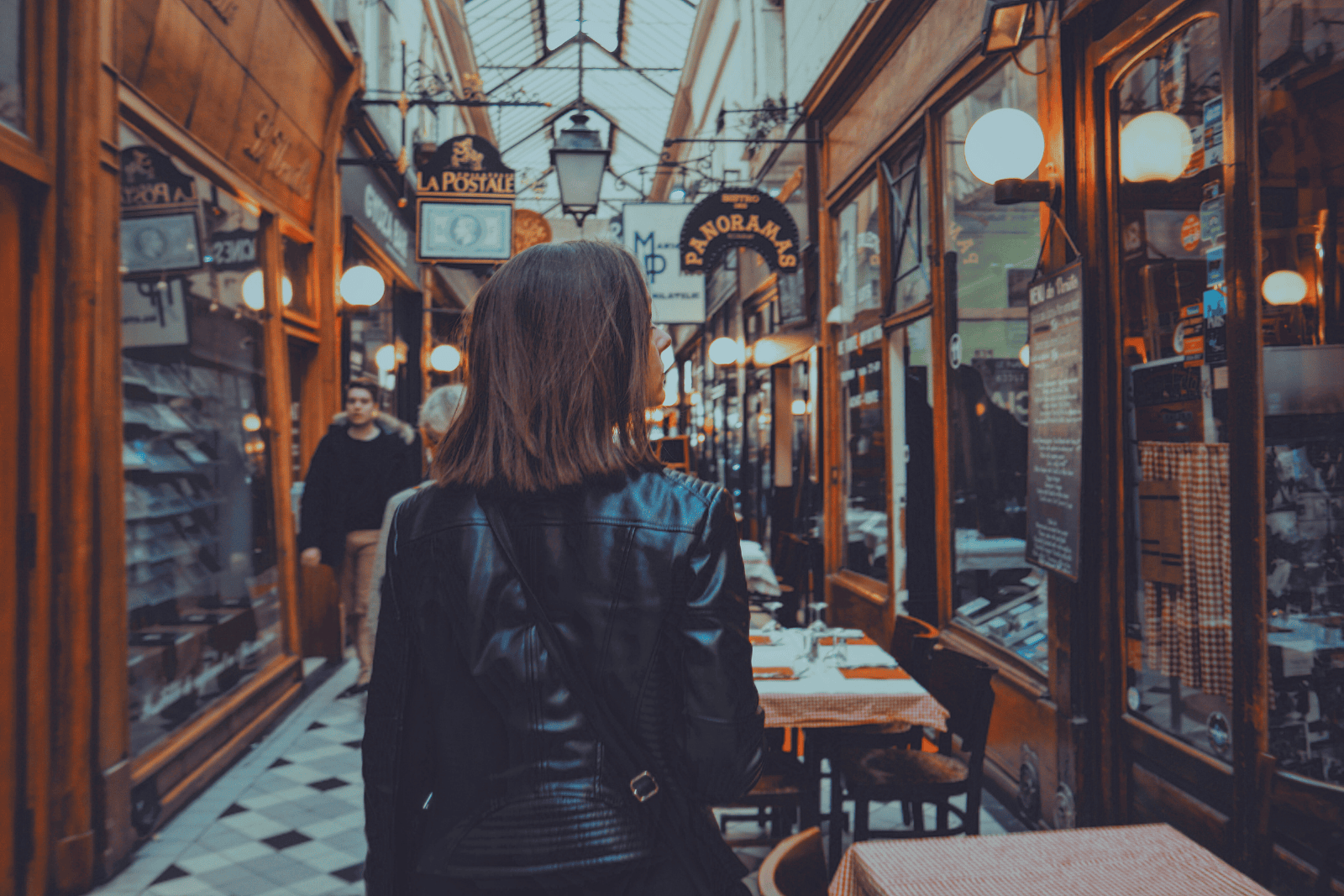 Image title woman walking along street with jewellery