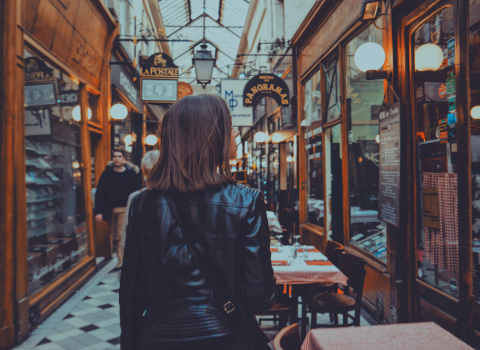 Image title woman walking along street with jewellery
