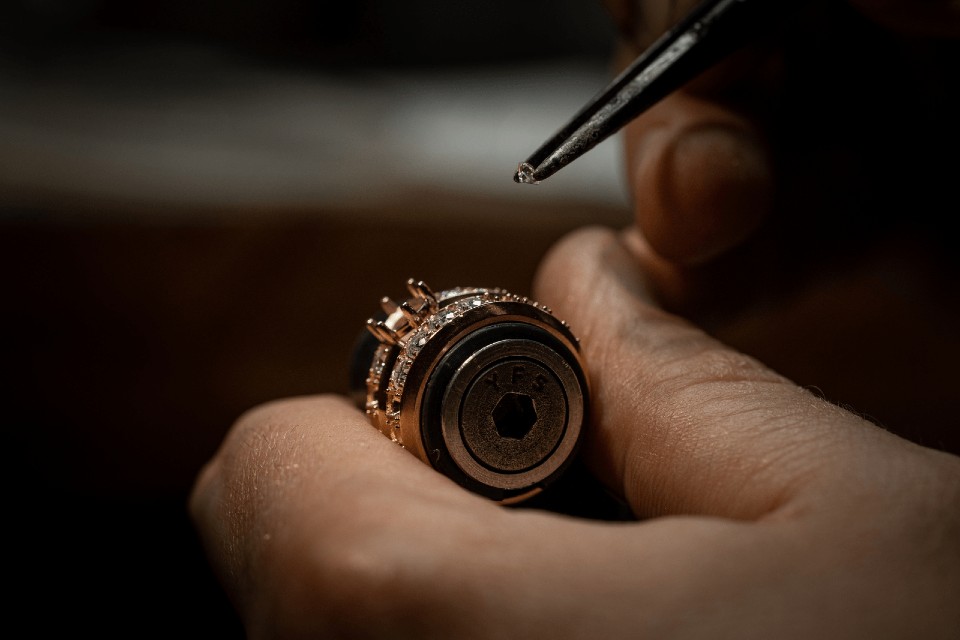 Image title putting diamonds on ring