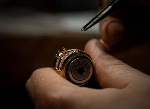 Image title putting diamonds on ring