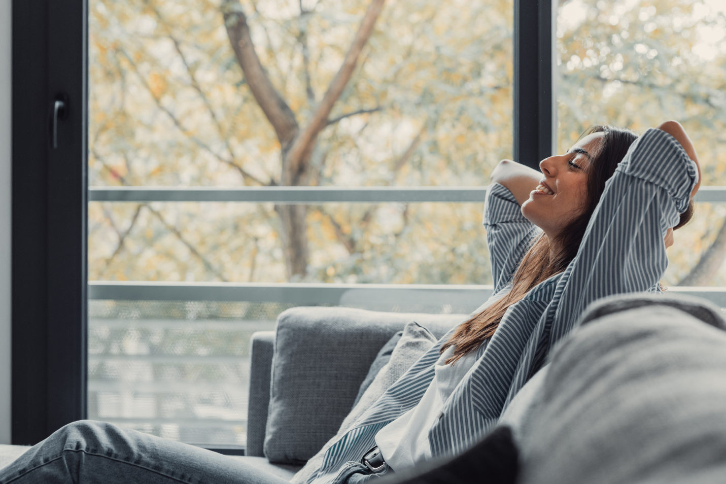 woman laying on couch woman laying on couch